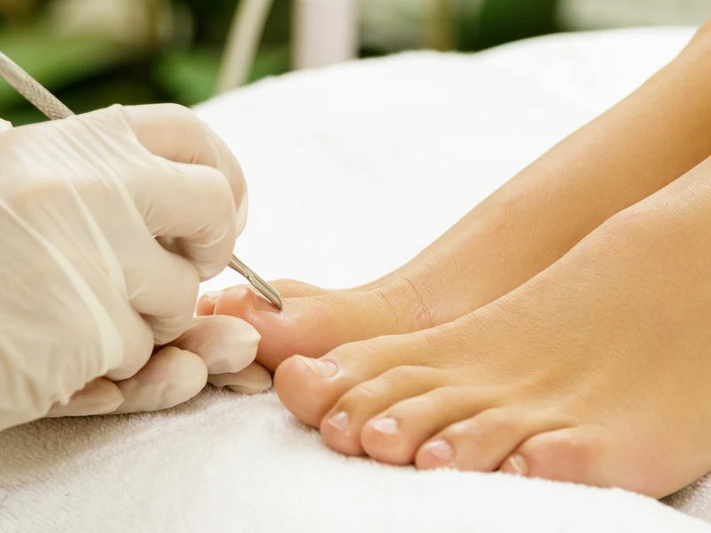Woman receiving a nail pedicure in Waterdown