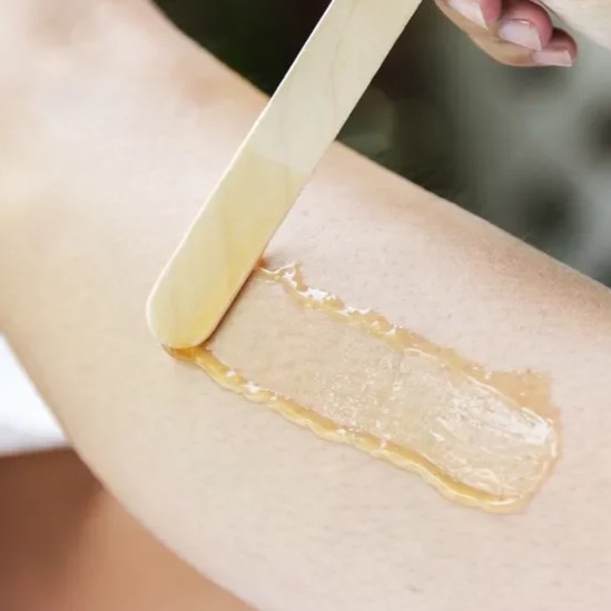 Beauty body sugaring treatment applied to arm at Lacey’s Body Sugaring in Waterdown